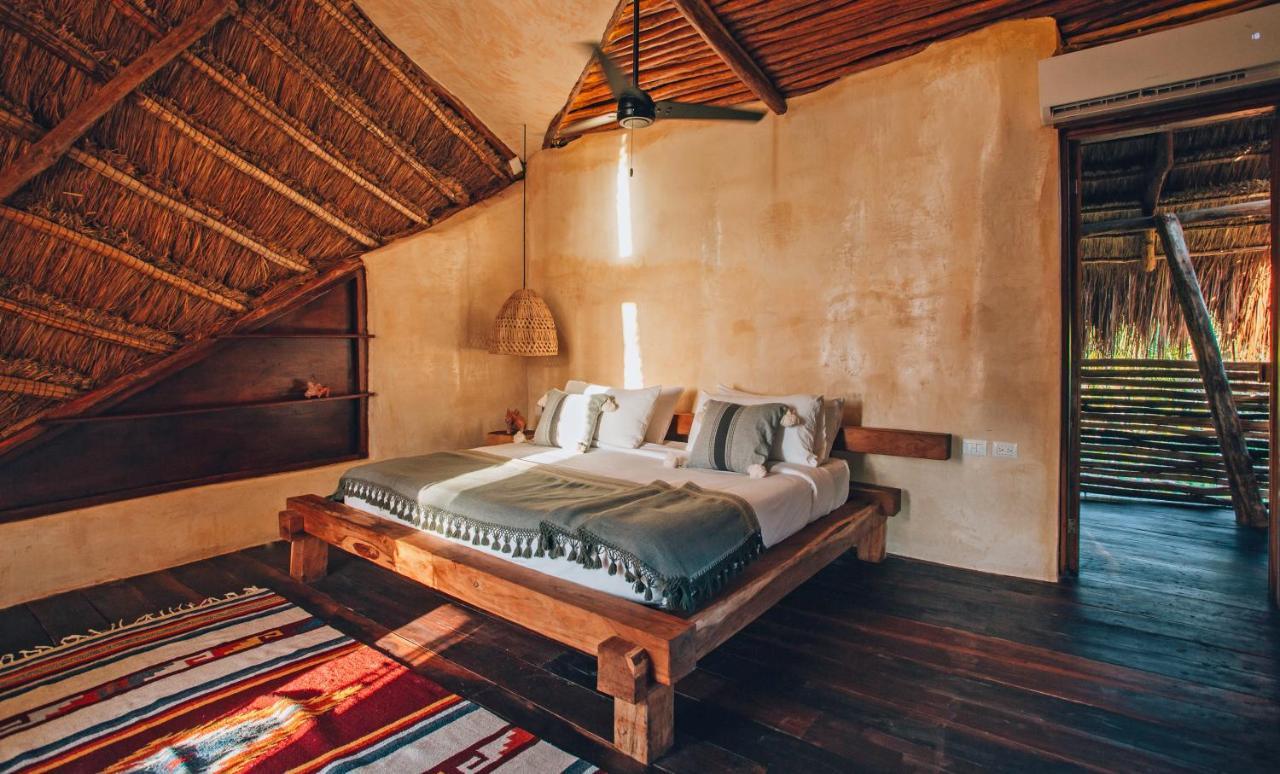 Ikal Tulum Hotel Exteriör bild A bedroom at the hotel
