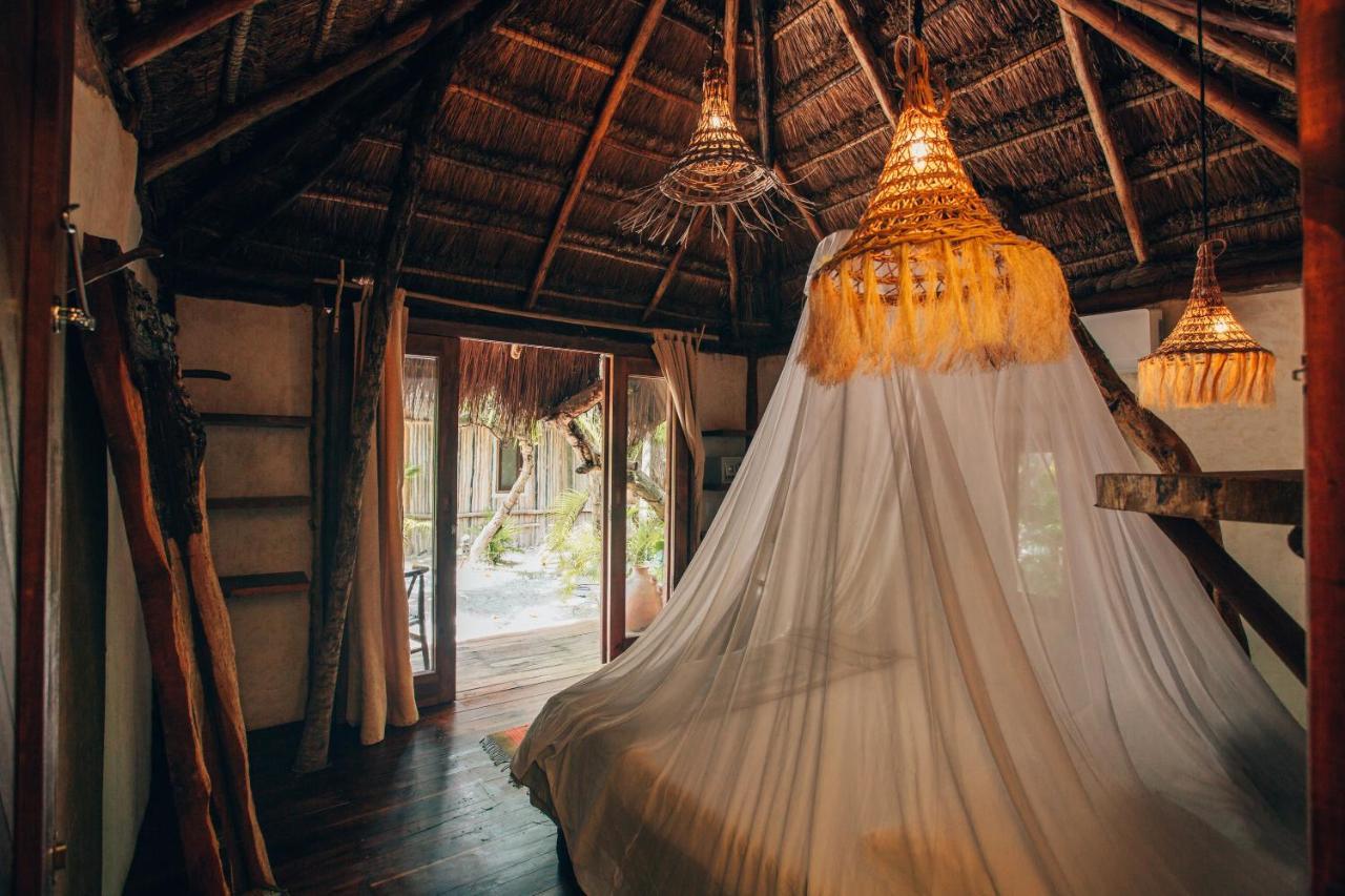 Ikal Tulum Hotel Exteriör bild Interior of a bungalow at the resort