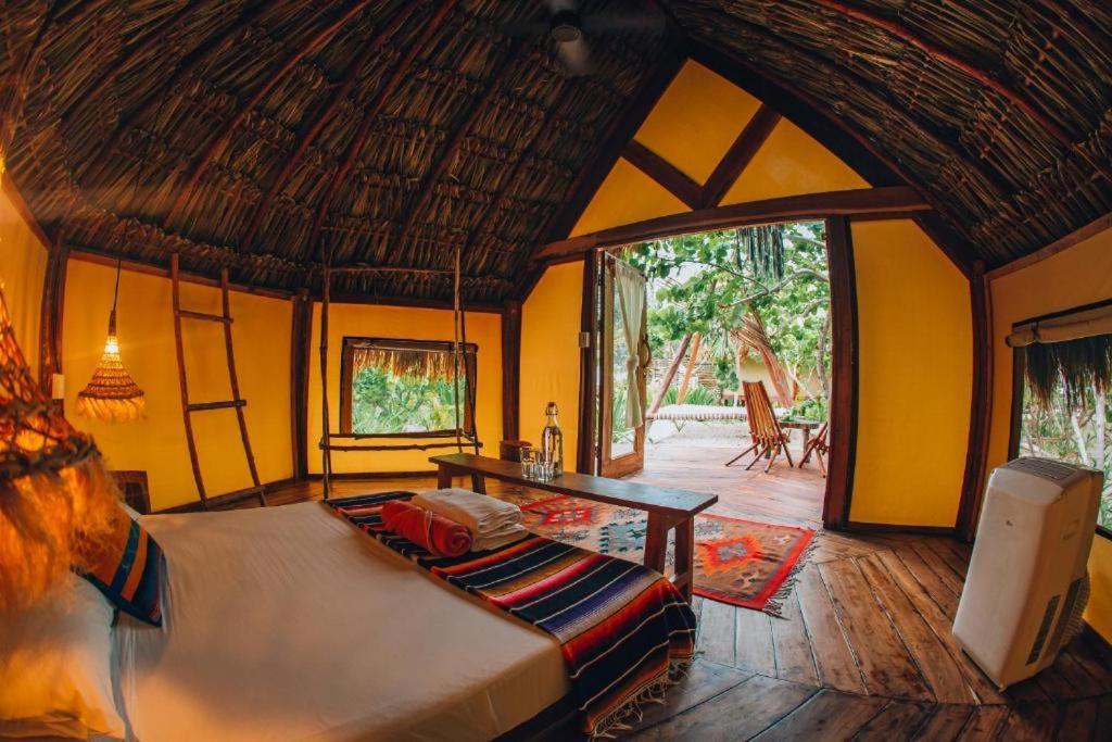 Ikal Tulum Hotel Exteriör bild Interior of a bungalow at Xel-Ha